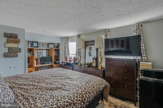 bedroom featuring a textured ceiling