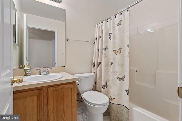 bathroom with toilet, shower / tub combo with curtain, and vanity