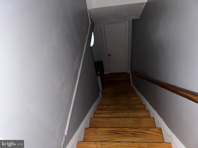 staircase with baseboards