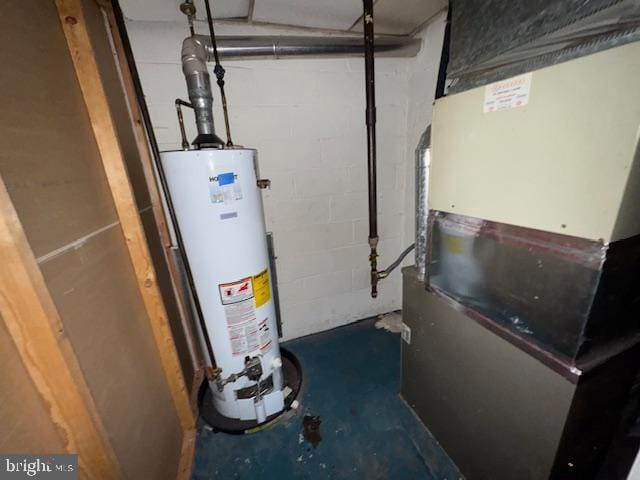 utility room with gas water heater and heating unit