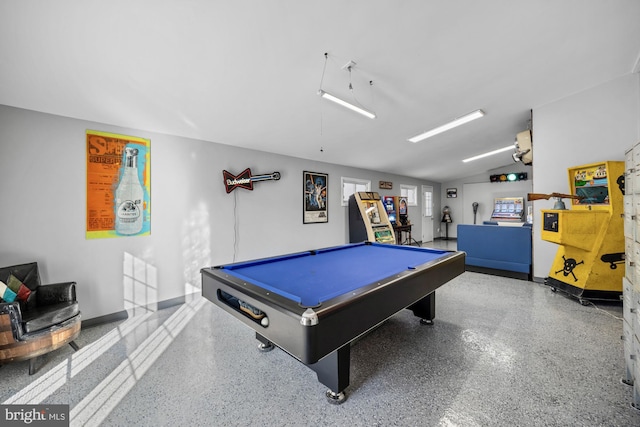 rec room featuring lofted ceiling, pool table, speckled floor, and baseboards