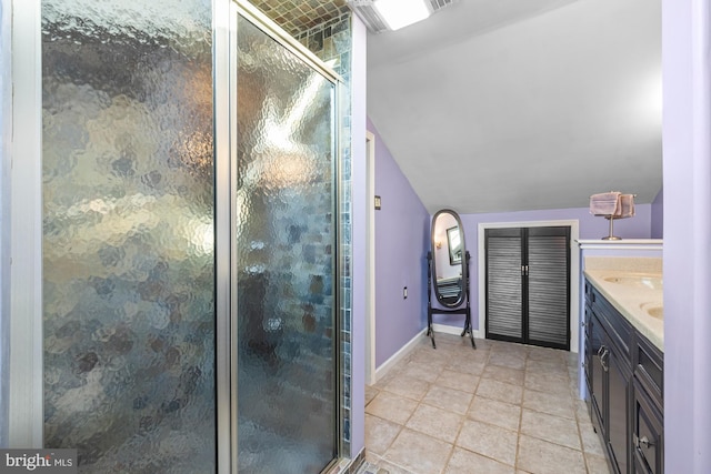 full bath featuring lofted ceiling, a stall shower, baseboards, and vanity