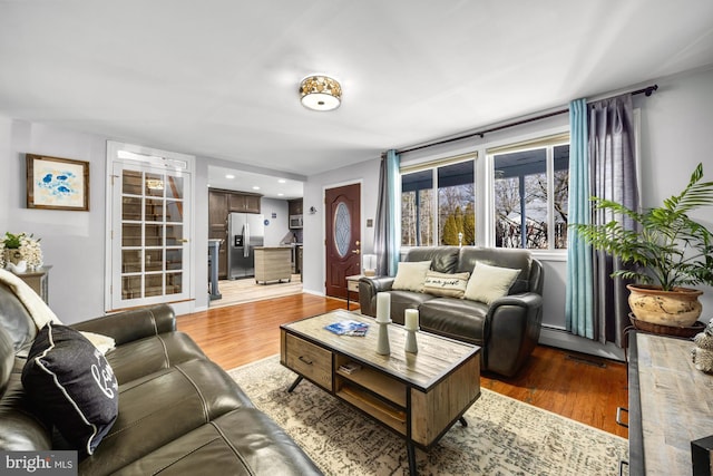 living room with wood finished floors