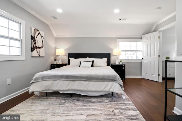 bedroom with visible vents, vaulted ceiling, and baseboards