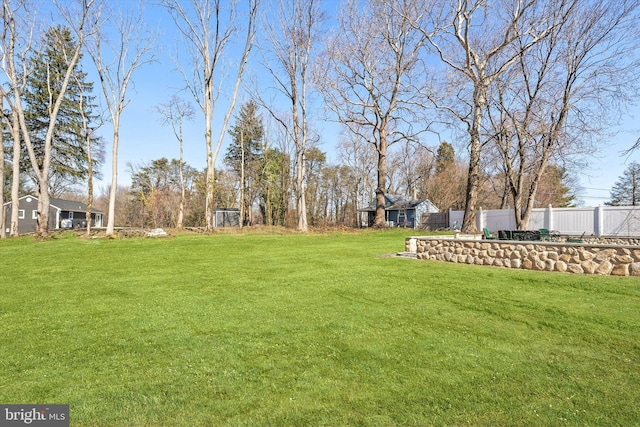 view of yard featuring fence