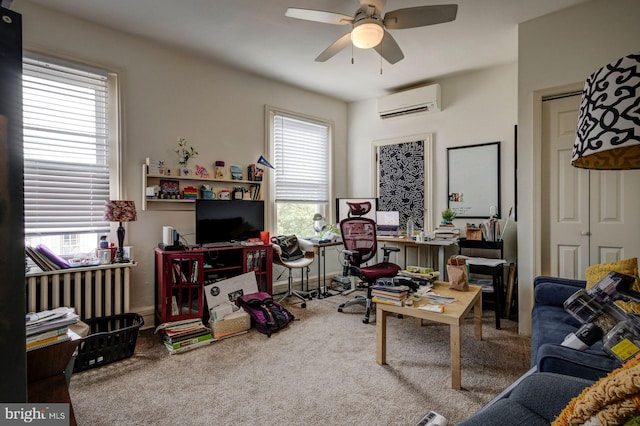 living area with carpet, a wall unit AC, and a ceiling fan