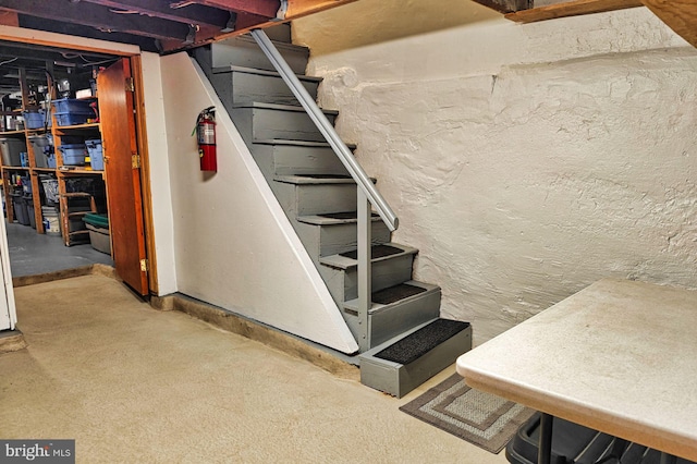 unfinished basement with stairway