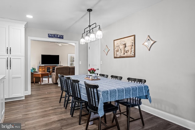 dining area featuring dark wood-style floors, recessed lighting, and baseboards