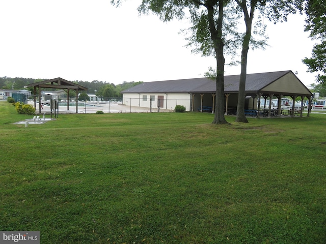 view of yard featuring a gazebo and fence