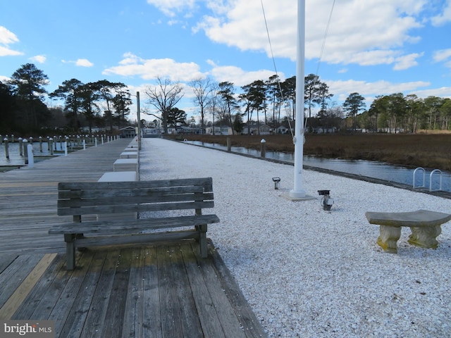 view of dock with a water view