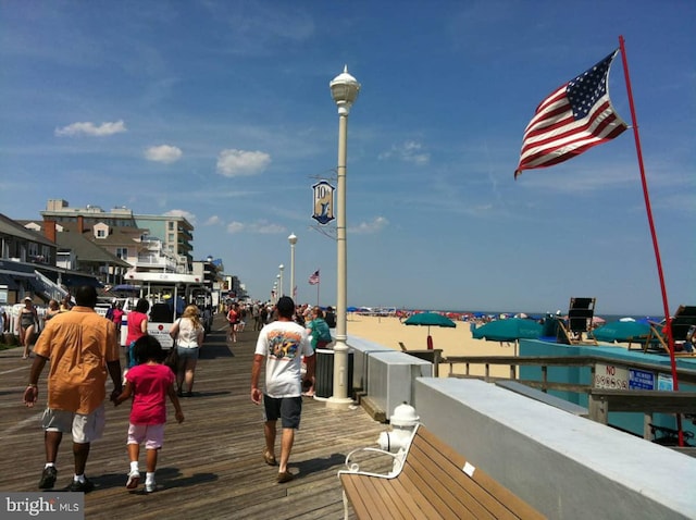 surrounding community featuring a boat dock