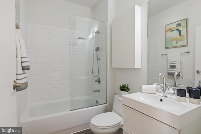 full bath featuring toilet,  shower combination, and vanity