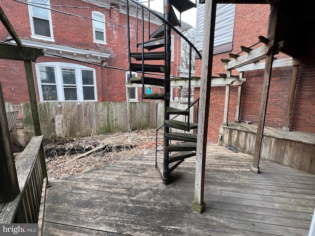 wooden deck with fence and stairway