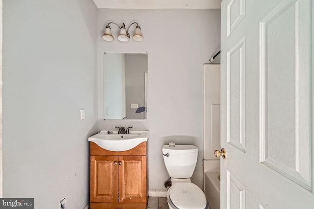 full bathroom featuring vanity and toilet