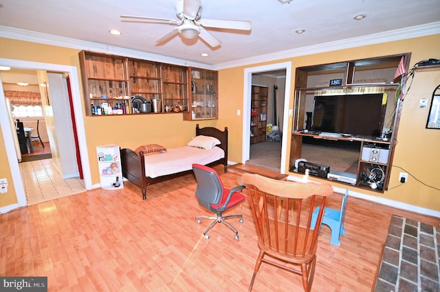 bedroom featuring baseboards, ornamental molding, wood finished floors, and recessed lighting