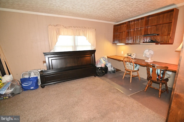 office space featuring built in study area and crown molding