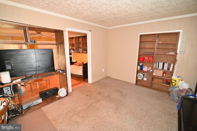 interior space with carpet floors and ornamental molding