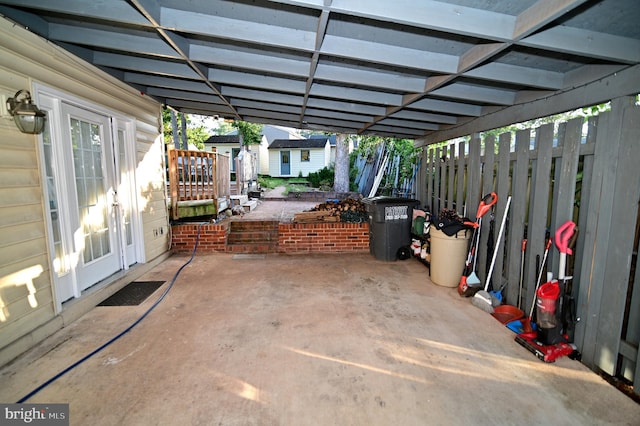 view of patio featuring fence