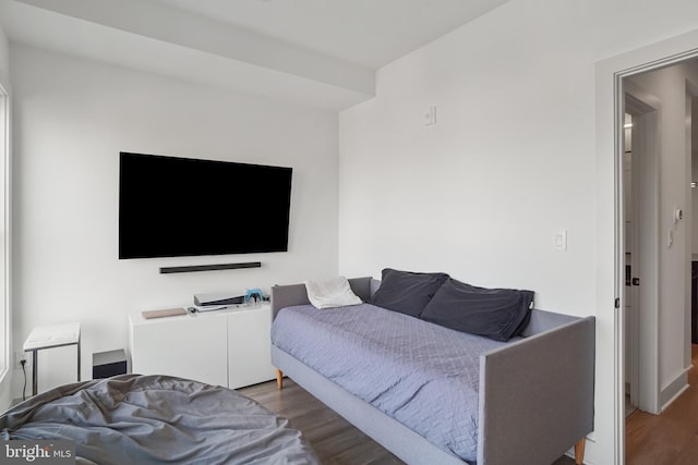 bedroom featuring wood finished floors