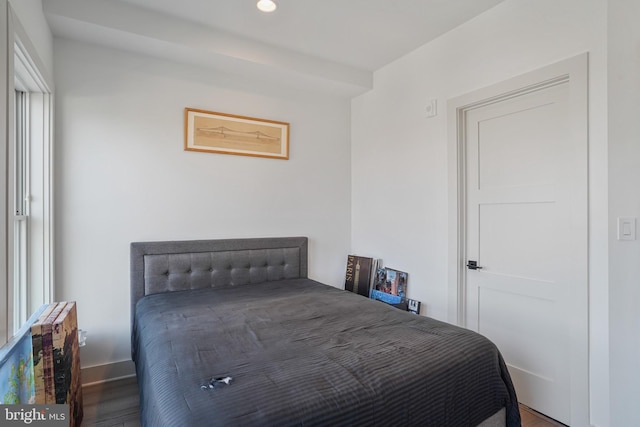 bedroom with recessed lighting, baseboards, and wood finished floors