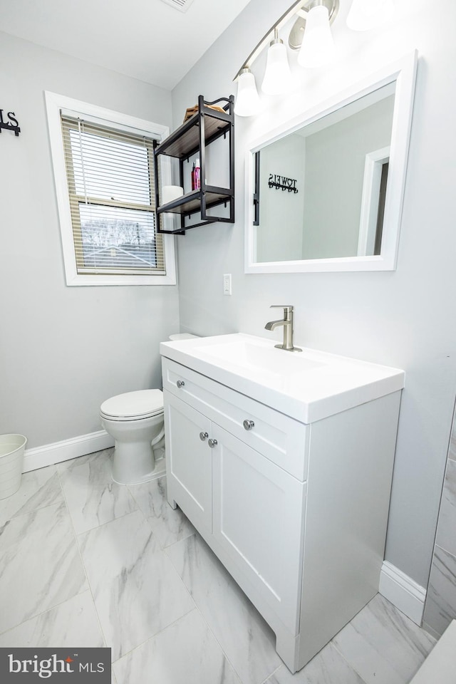 916 Phillip Powers Dr, Laurel, MD 20707 - bathroom with marble finish floor, vanity, and baseboards