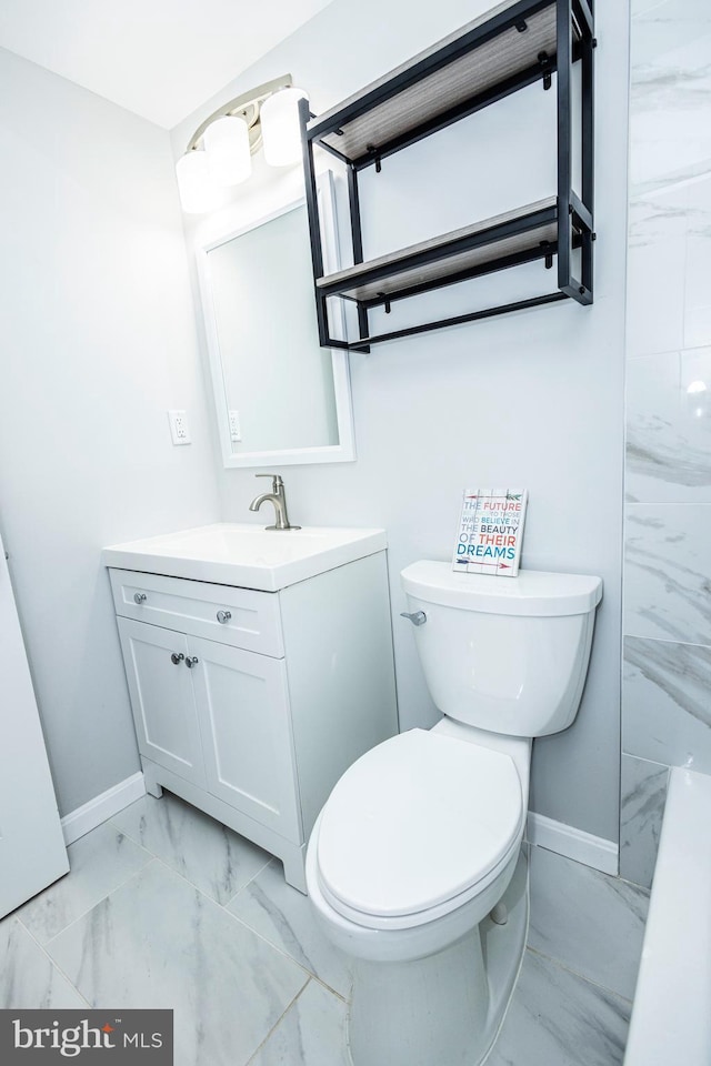 916 Phillip Powers Dr, Laurel, MD 20707 - bathroom with toilet, marble finish floor, baseboards, and vanity