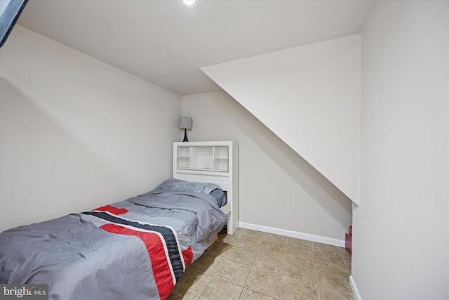 bedroom with baseboards