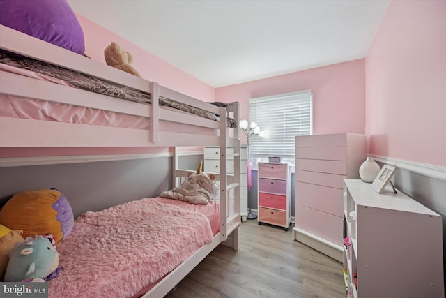 bedroom featuring wood finished floors