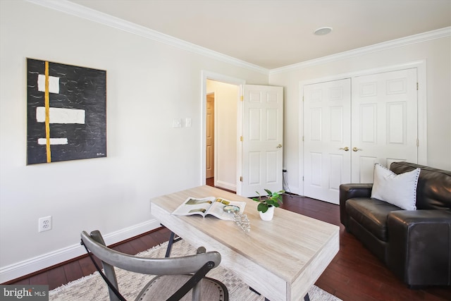 home office with hardwood / wood-style flooring, baseboards, and ornamental molding