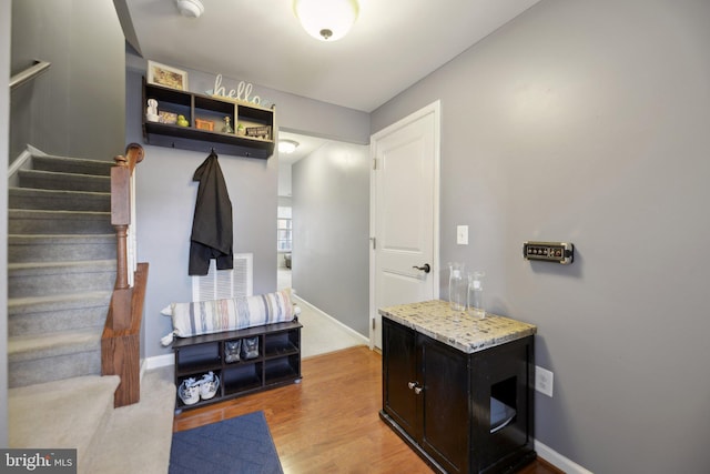 interior space with light wood-style flooring and baseboards