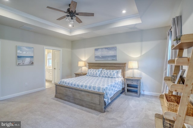 bedroom featuring baseboards, recessed lighting, a raised ceiling, and light colored carpet