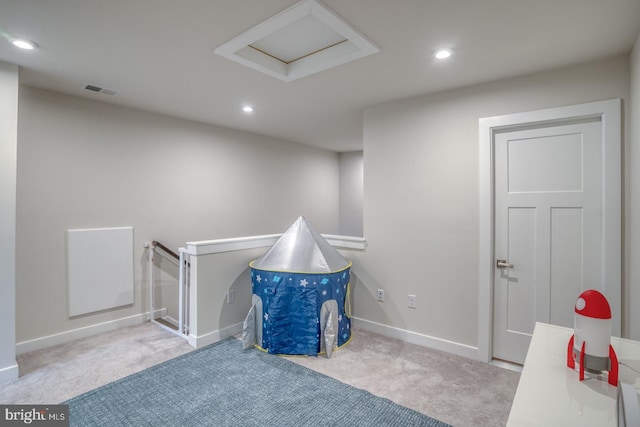 game room featuring carpet floors, attic access, and recessed lighting