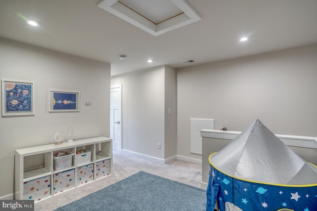 recreation room featuring recessed lighting, visible vents, baseboards, carpet, and attic access