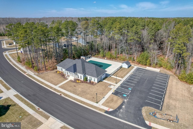 drone / aerial view with a view of trees