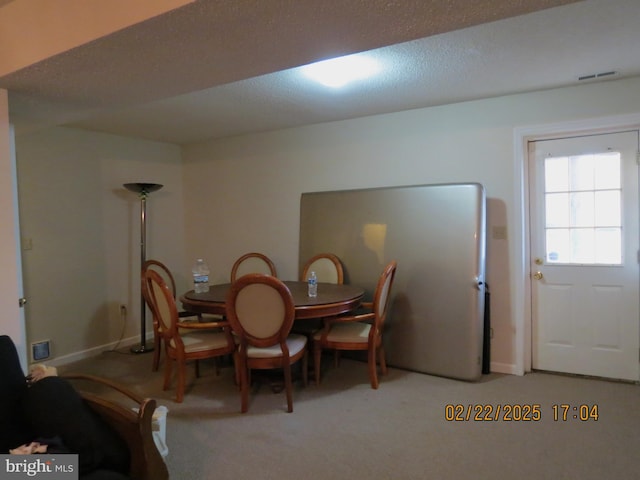 dining room with visible vents