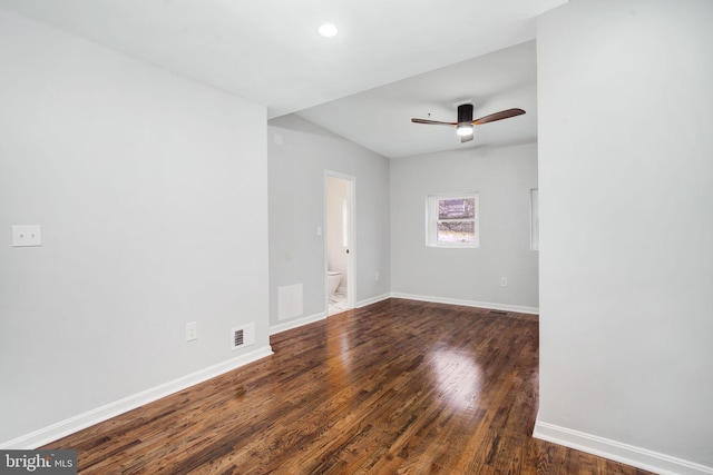 unfurnished room featuring visible vents, baseboards, ceiling fan, and hardwood / wood-style floors