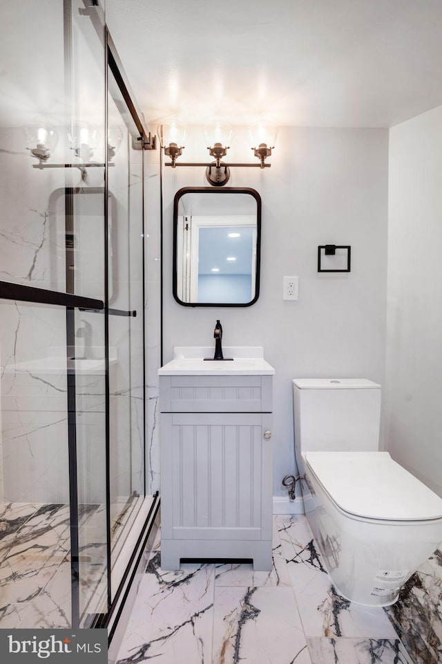 bathroom with toilet, marble finish floor, a marble finish shower, and vanity