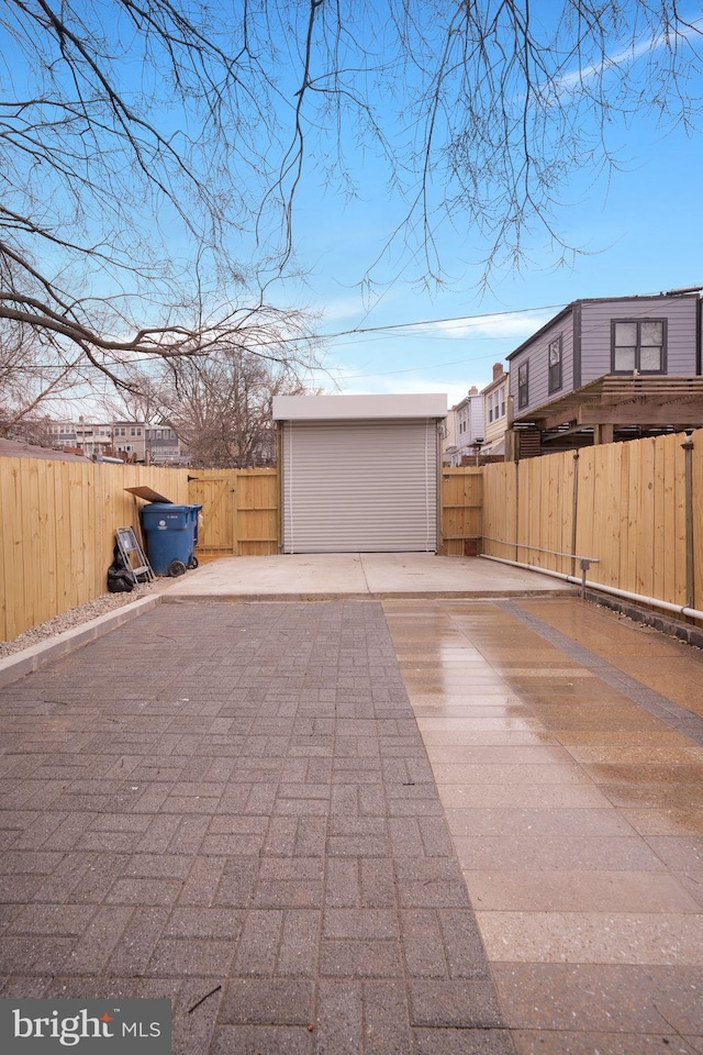 garage featuring fence