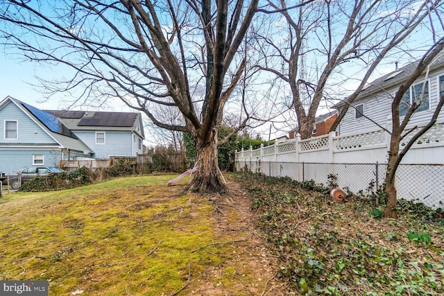 view of yard with fence