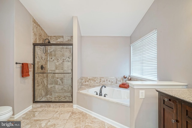 bathroom with toilet, a stall shower, baseboards, and a garden tub