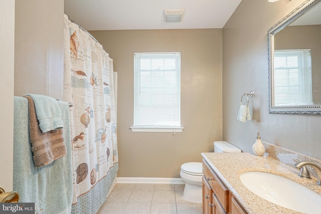 bathroom with a wealth of natural light, tile patterned flooring, visible vents, and toilet