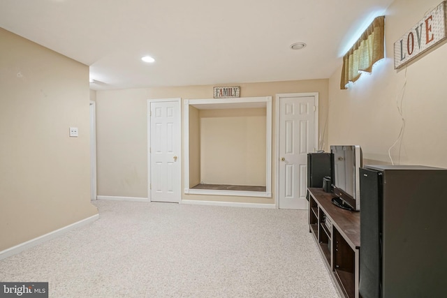 interior space featuring baseboards, carpet flooring, and recessed lighting