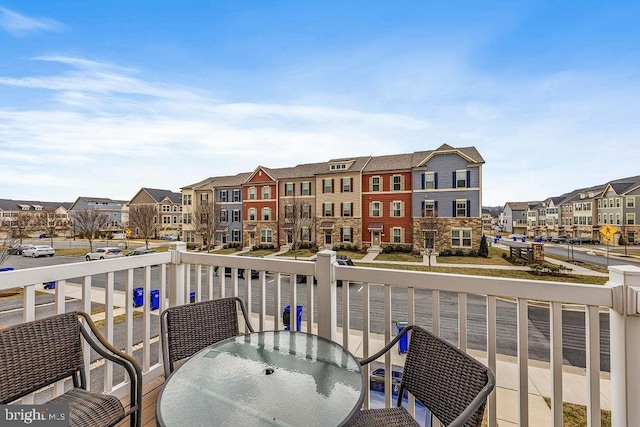 balcony featuring a residential view