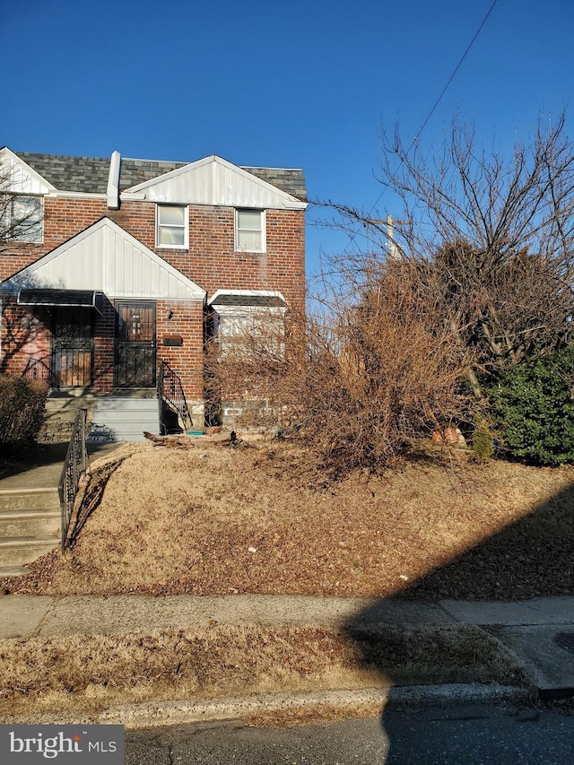 view of front of property with brick siding