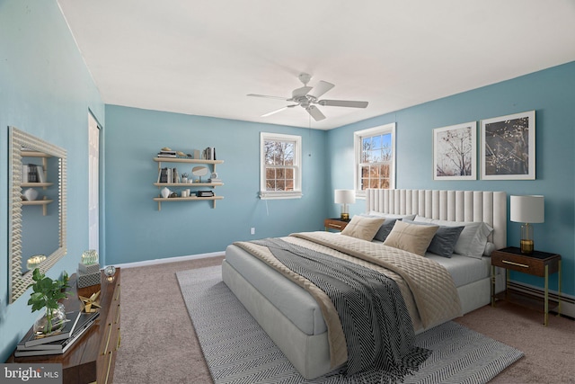 bedroom with carpet, a ceiling fan, and baseboards