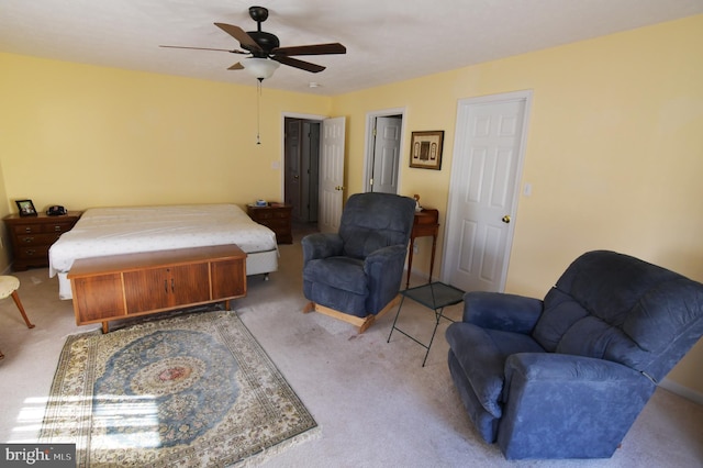 bedroom featuring ceiling fan and carpet flooring