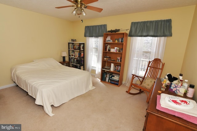 carpeted bedroom with a textured ceiling