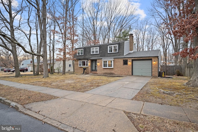 view of front of property featuring brick siding, roof with shingles, a chimney, an attached garage, and fence