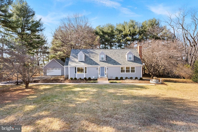 new england style home featuring a chimney and a front yard