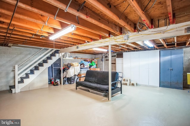 unfinished basement with stairway